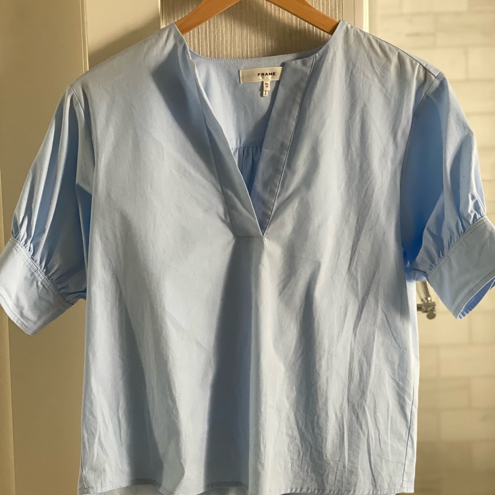 Frame top size XS worn once and dry cleaned. Super cute and beautiful blue.